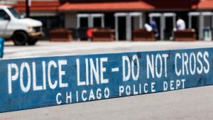 Chicago police officer wounded after the city is rocked by shootings that leave 14 wounded and two dead