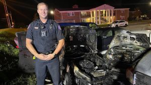 Tennessee police officer rescues unconscious man from burning vehicle with help from par-amedic