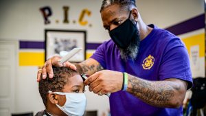 Cops and Barbers initiative brings police and community members together to bridge the gap
