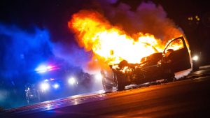 Oregon police officer pulls man from car engulfed in flames