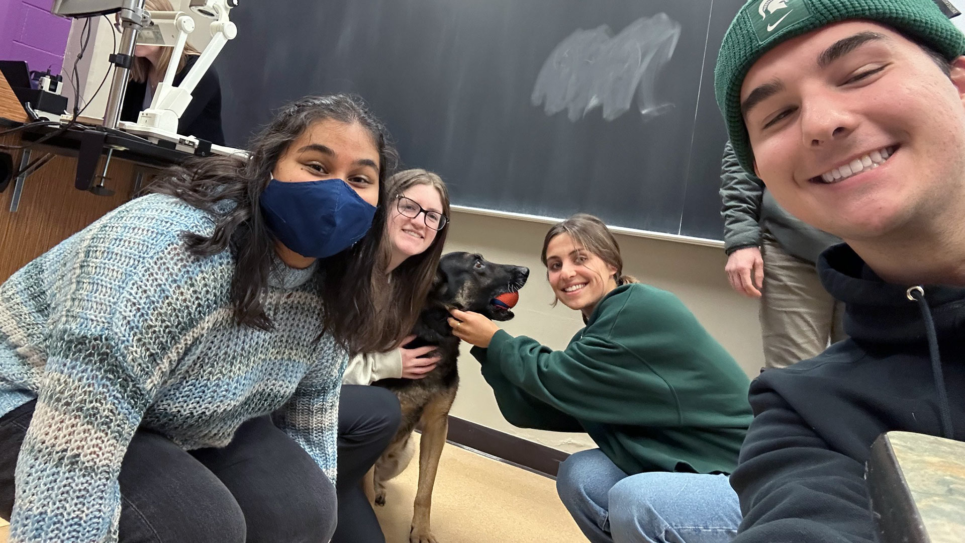 police-k-9-comforts-michigan-state-university-students-returning-to-class-after-campus-mass-shooting-8