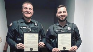 Two Marinette police officers honored by city after preventing suicide attempt