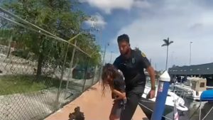 Miami police officer hailed as hero for jumping into river to rescue drowning child with autism