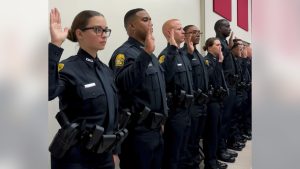 Tampa Police Department officers pass the torch to next generation of officers in swearing-in ceremony