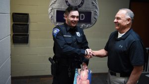 Rookie Indiana cop reunites with retired lieutenant who saved his life when he was a baby